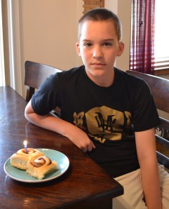 Trevor's all time favorite -  cinnamon rolls - and a happy birthday song to start the day